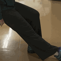 Short clip of a person doing sitting knee stretch