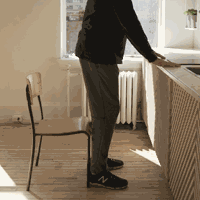 Short clip of a person doing mini knee bends